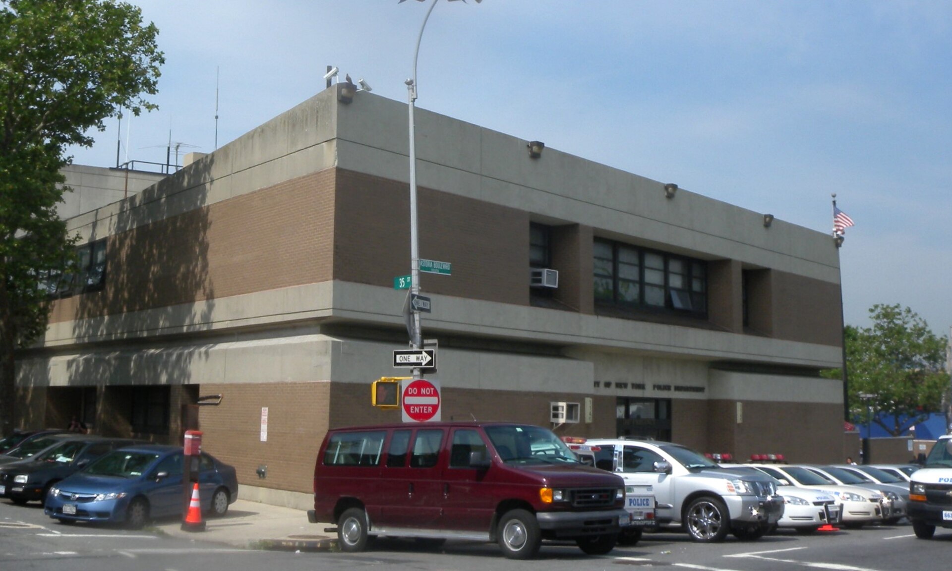 The NYPD 114th Precinct station house on Astoria Boulevard in Astoria, Queens