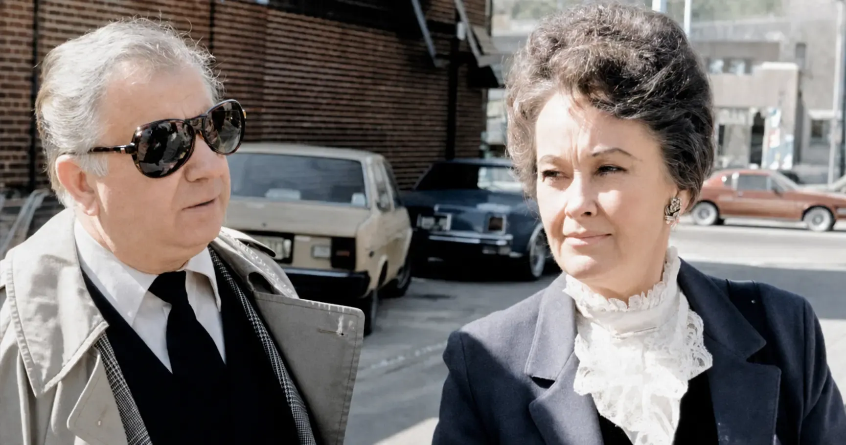 Paranormal investigators Ed and Lorraine Warren standing together outdoors